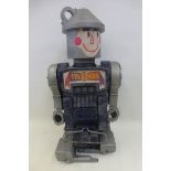 A plastic Wizard of Oz Tin Man robot by Remco Industries Incorporated.