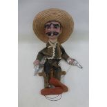 A Mexican string puppet, circa 1950s, in good condition.