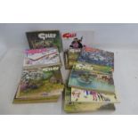 A collection of assorted Giles annuals.