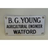 A small enamel name plate advertising B.G. Young Agricultural Engineer, Watford, 5 x 2 1/2".