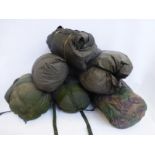 Six military sleeping bags.