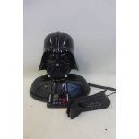 A novelty telephone in the form of Darth Vader, from Star Wars.