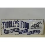 A good Thorley's Food part pictorial rectangular enamel sign with 'trotting horse' image, by