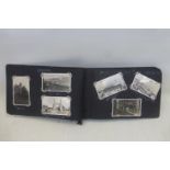 A photograph album of in excess of 200 photographs about the WWII ship and crew of H.M.S. Durban.