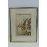 A late 19th Century framed and glazed watercolour of a town scene, signed.