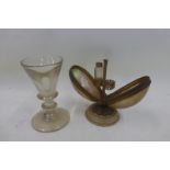 An 18th Century squat drinking glass and an unusual M.O.P and brass mounted novelty miniature