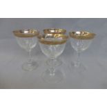 Four decorative Murano glasses.