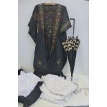 A selection of Edwardian and later clothing including christening gowns and an embroidered kimono