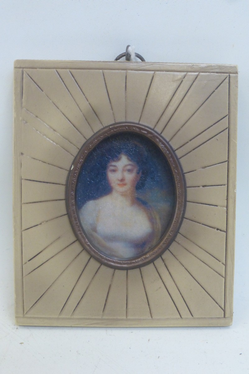 A reproduction portrait miniature.