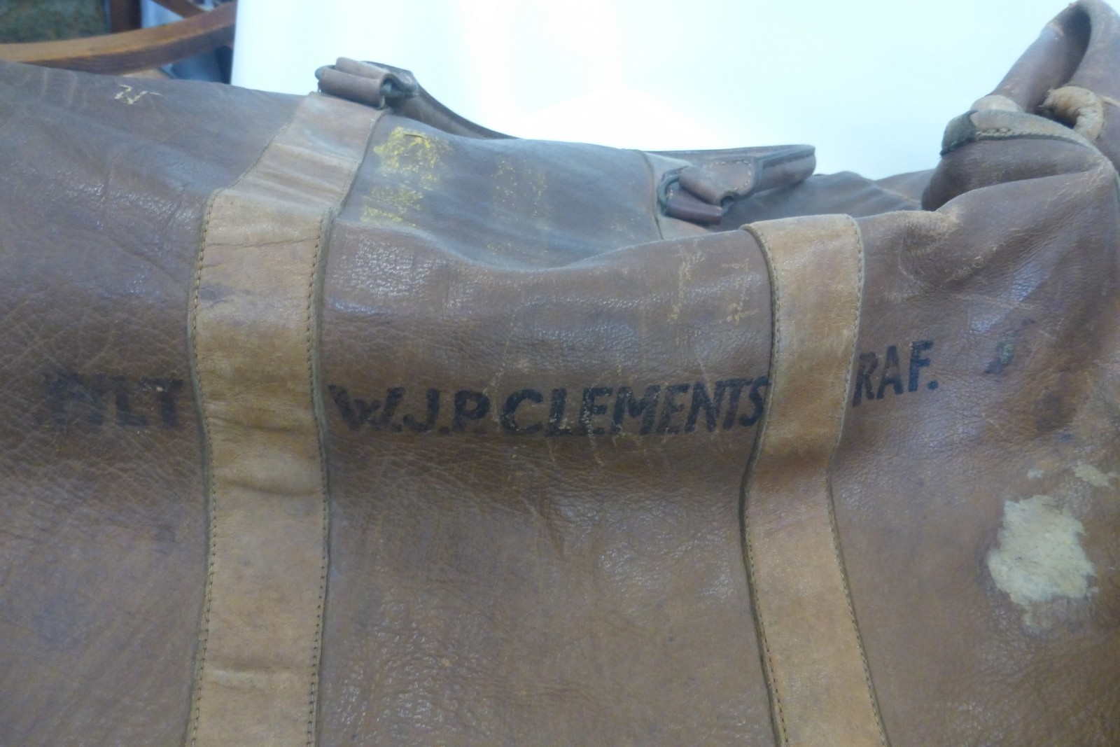 An early 20th Century brown leather suitcase and a brown leather holdall. - Image 2 of 5