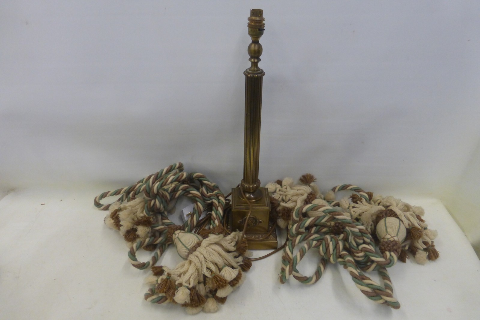 A set of four good quality country house curtain tie backs, together with a good quality modern