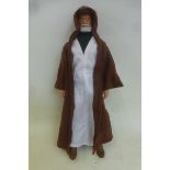 An original Kenner 12" Star Wars figure - Obi-Wan Kenobi, in near excellent condition.