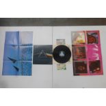 A Pink Floyd 'Dark Side of the Moon' LP, hard turquoise triangle and complete with posters and