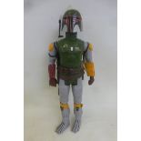 An original Kenner 12" Star Wars figure - Boba Fett, with wookie scalps and rocket in near excellent