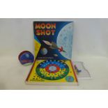 A boxed Moon Shot game by Cadaco and a tinplate Orbitoy.