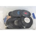 A box of mainly 1960s singles.