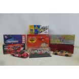 Five boxed Nascar precision models.