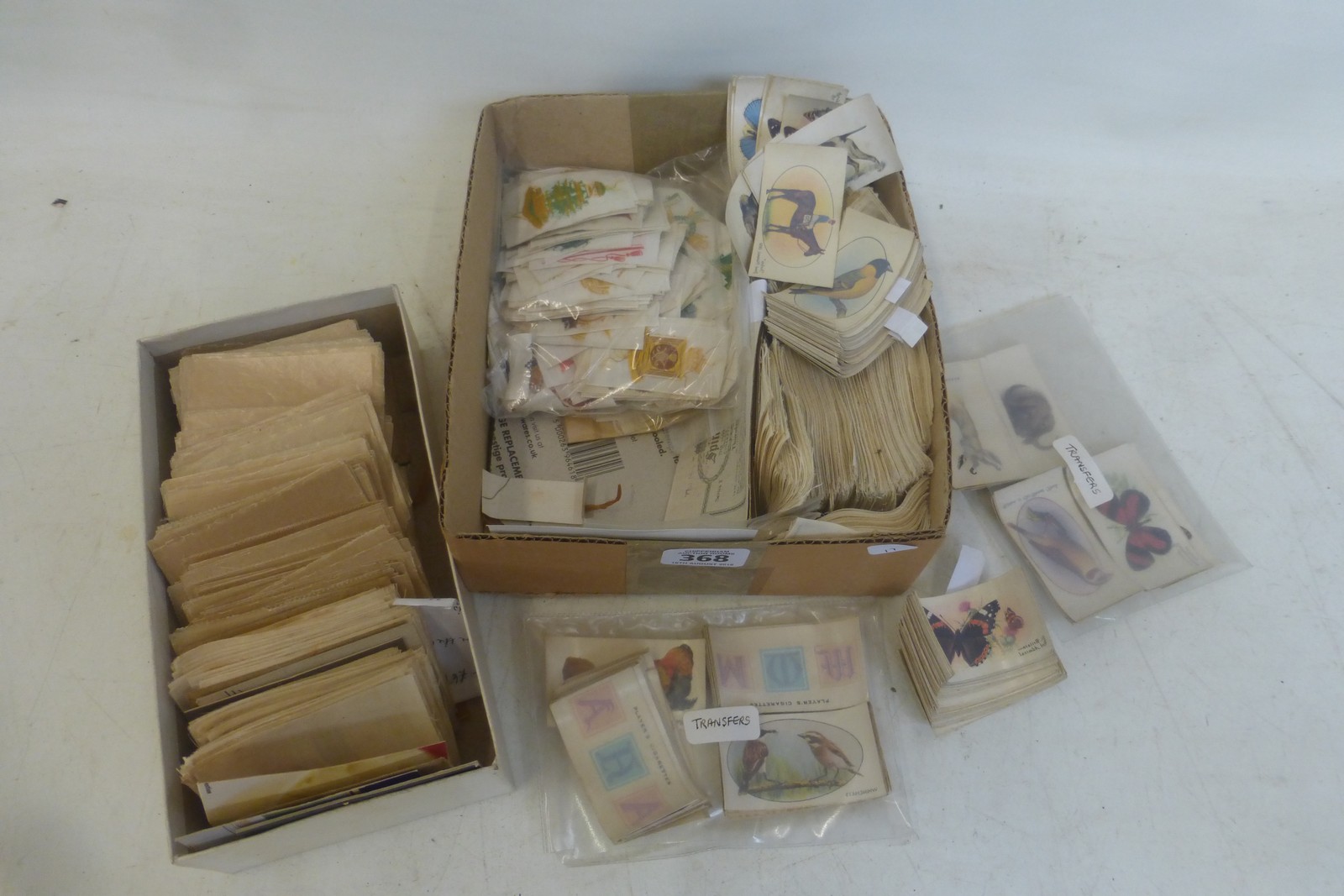 Small box of loose transfer cards, silks etc.