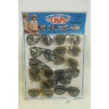 An original Chips toy shop display complete with sunglasses.