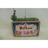 An early boxed Pelham Puppet: Caterpillar, green, circa early 1950s, with original tissue paper,