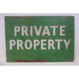 A white and green painted wooden sign 'Private Property', 36 x 24".