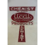 Two glass chemist signs, one for Ucal products.