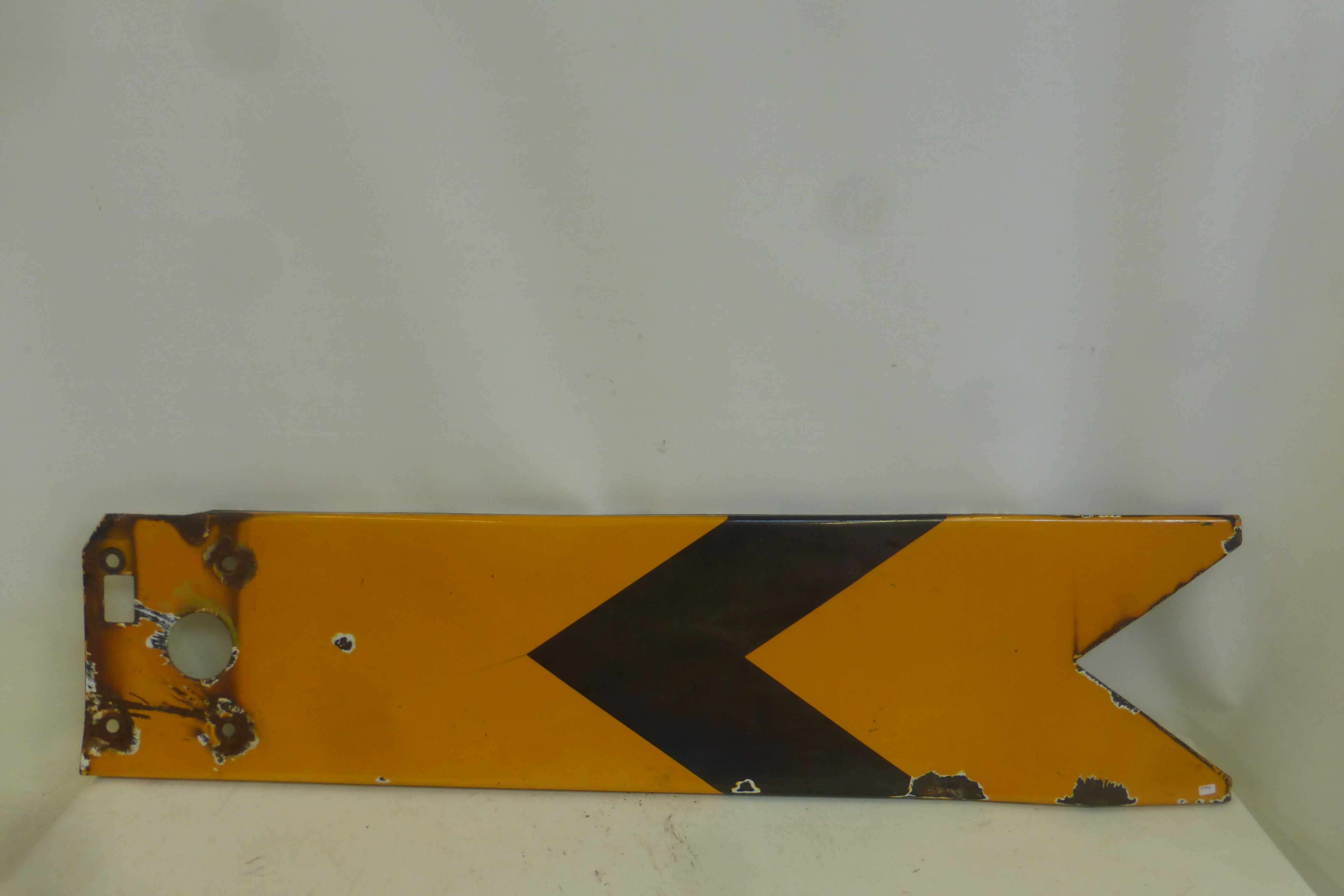 A yellow and black enamel signal arm, 48 x 12".