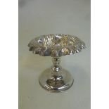 An unusual silver pedestal bowl.