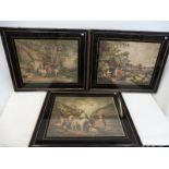 Three 19th Century coloured rural prints, set within black glass mounts.