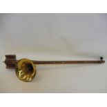 A phono fiddle with brass horn