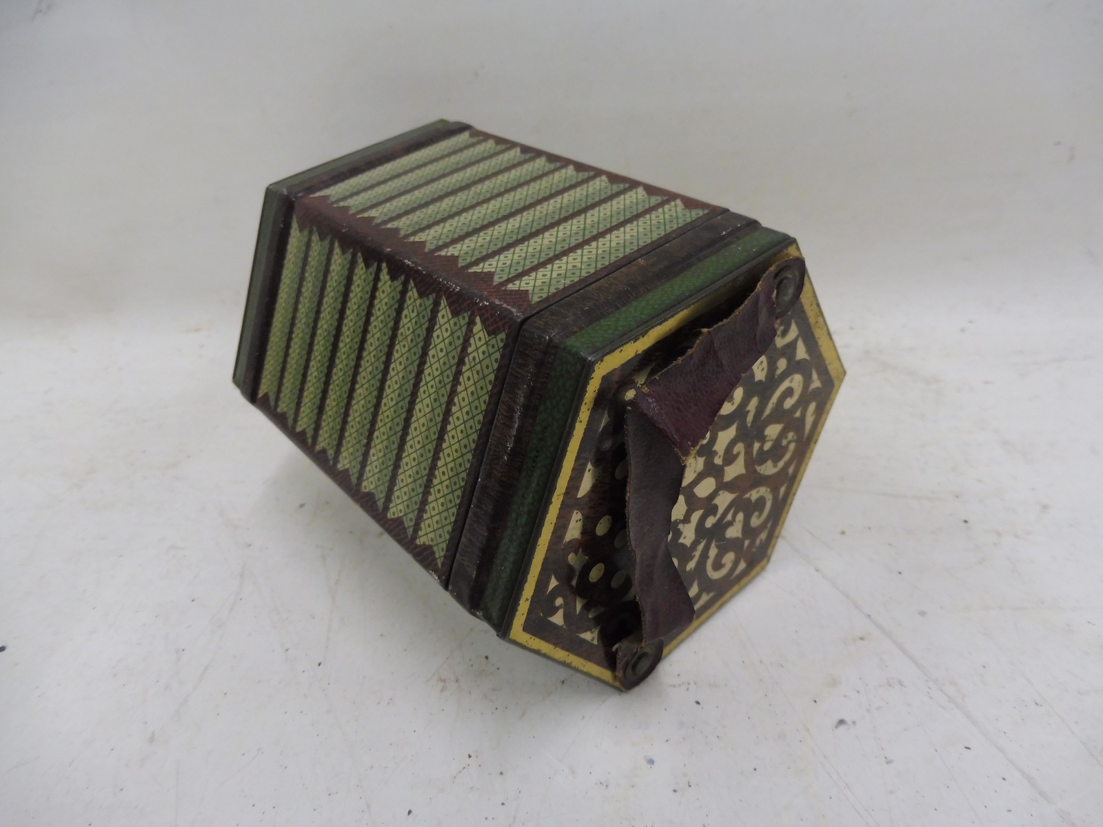 A good Jacob's Biscuits hexagonal biscuit tin in the form of a concertina accordion, with sound