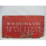 A W.H.Smith & Son 'Books bound in all styles hanging enamel sign, 51 x 27".