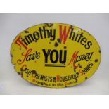 A Timothy Whites Cash, Chemists and Household Stores oval enamel sign, 35 1/2 x 25".