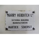 A small enamel plaque advertising Harry Hebditch Limited, Builders of Martock, Somerset, 6 x 4".