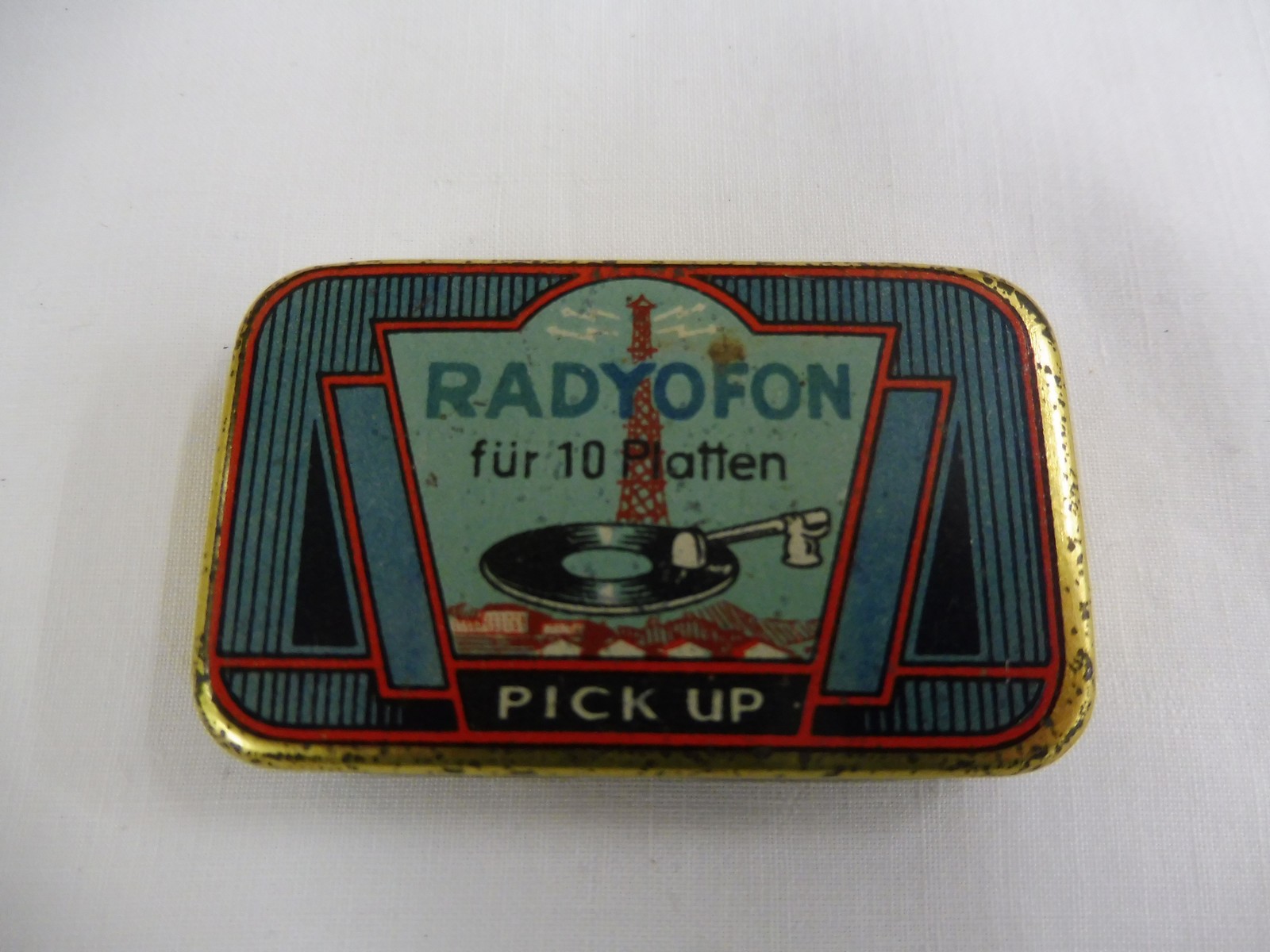 A gramaphone needle tin.