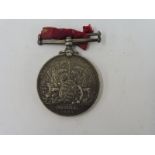 A Boxer Rebellion 1900 medal awarded to Private W.H. Lewis, RM serving on H.M.S. Centurion.