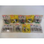 Nine Timpo carded medieval knight figures.