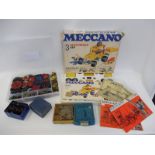 A Meccano motorised set no. 3, Books 0-1 and 2-3, also a plastic box of Meccano parts, brochures