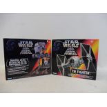 Two boxed Kenner Star Wars models, Imperial AT-ST and Tie Fighter.