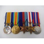 A group of WWI and WWII medals awarded to Private E.J. Gray, North D. Fusiliers No. 45310.