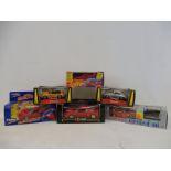 Six boxed scale models of sports cars including Corgi and Burago, mainly Porsches and Ferraris.