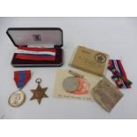 A cased Faithful Service medal awarded to Peter Alexander Knight plus two WWII medals also awarded