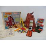 A Matchbox Action Command Rescue Centre with assorted cars.