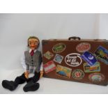 A 'Grumpy Old Git' with suitcase; Kalini made; moving eyes, mouth, moving arm stick with