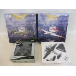 Two boxed Corgi Aviation Archive model aircraft and two others.