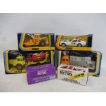 Six assorted boxed Corgi vehicles.