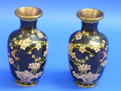 A pair of Japanese cloisonné Vases, of ovoid form, the black-ground bodies decorated in coloured