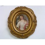 A Berlin (K.P.M.) porcelain plaque, late 19th century, oval, depicting a fair-haired beauty in