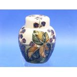 A Moorcroft pottery 'Blackberry' pattern Ginger Jar, with cover, impressed marks and painted