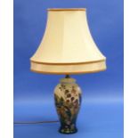 A Moorcroft pottery 'Blackberry' pattern table Lamp, of vase form with shade, impressed marks,